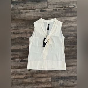 Sleeveless blouse still with tags…